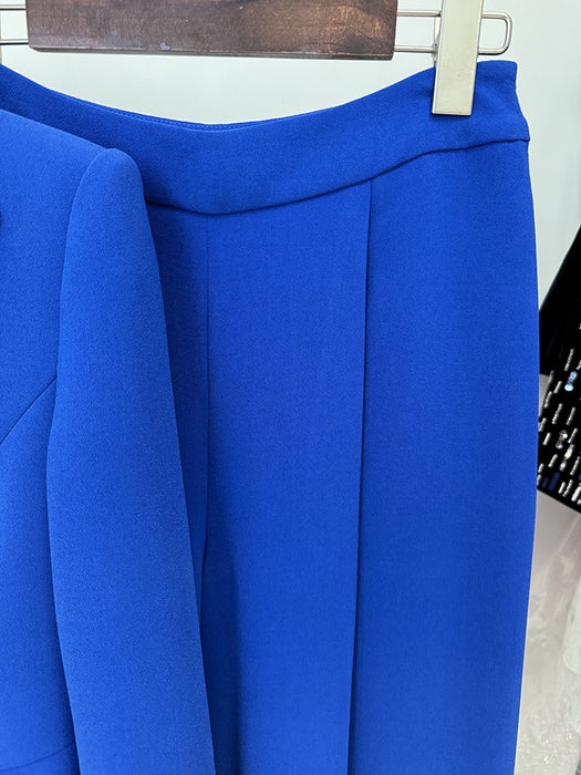 Close-up of a blue garment on a hanger with a white background
