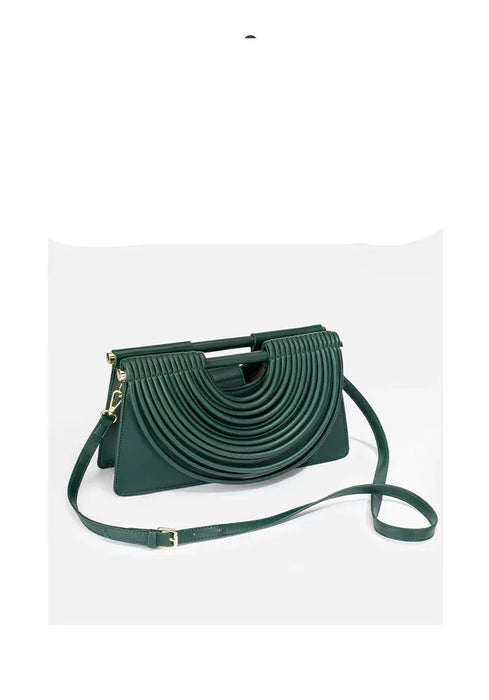 Green handbag with a strap on a white background, featuring 'Online Sales' text.