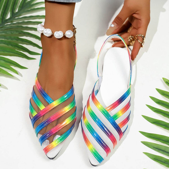 Multicolored strappy shoes with a white background
