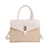 A structured handbag with a cream-colored faux leather top handle and flap, combined with a beige woven-texture lower body panel, featuring a gold-tone turn-lock clasp and a matching shoulder strap, set against a plain white background.