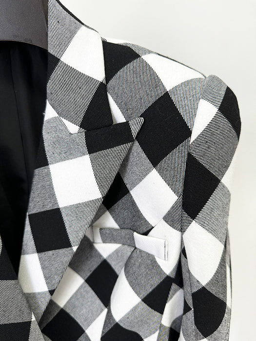 Black and white checkered pattern on a textured surface
