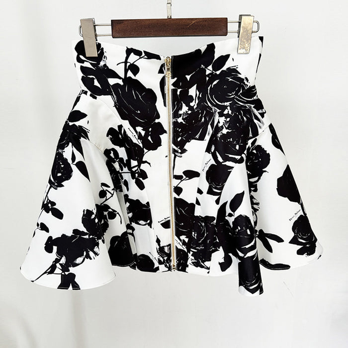 Black floral patterned skirt on a white background