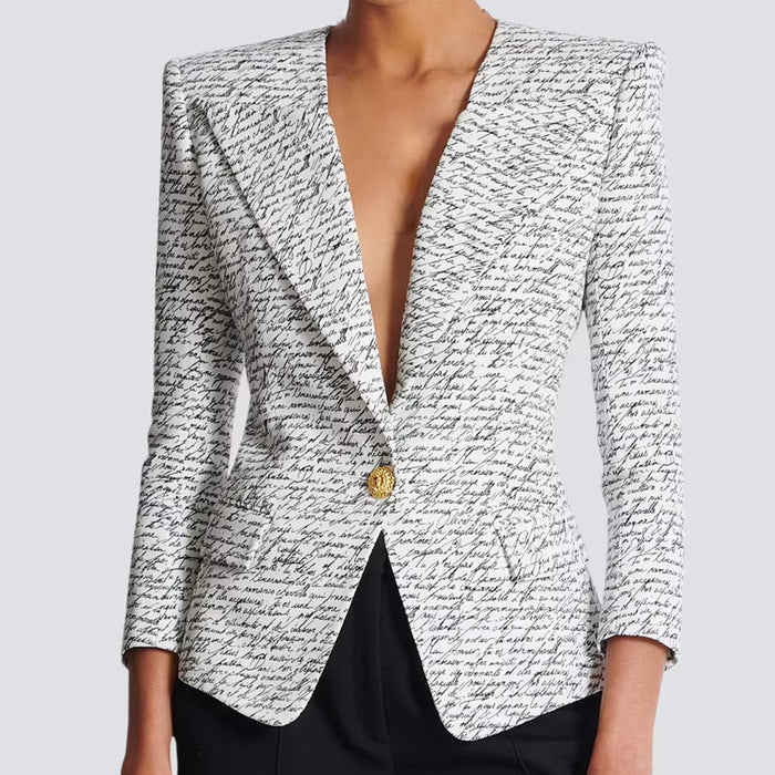 Textured blazer with a gold button on a plain background