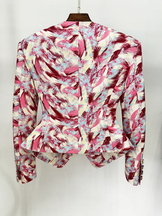 Floral patterned blouse on a hanger against a white background