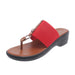 Red sandal with brown straps on a white background