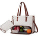White quilted handbag with brown straps containing snacks and an orange on a white background