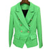 Green blazer with gold buttons on a hanger against a white background