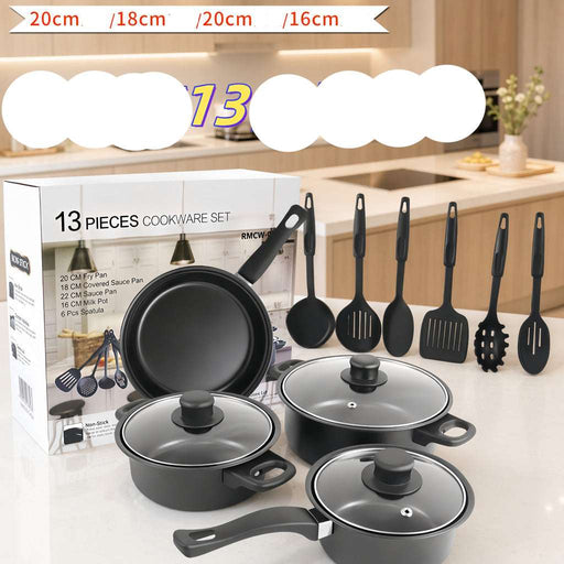 A 13-piece cookware set displayed in front of its retail box, featuring black non-stick pots, pans, lids, and utensils, with a kitchen background.