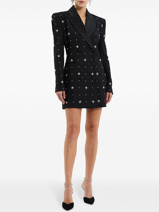 Black blazer dress with star patterns on a white background