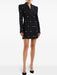Black blazer dress with star patterns on a white background
