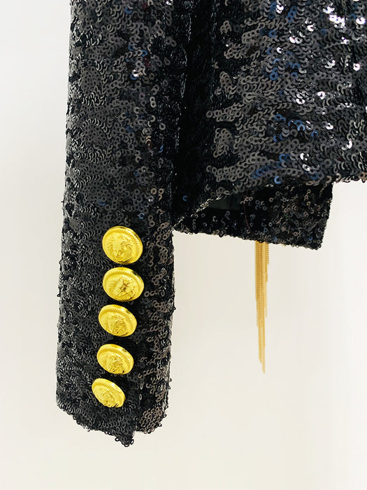 Black sequined jacket with gold buttons on a white background