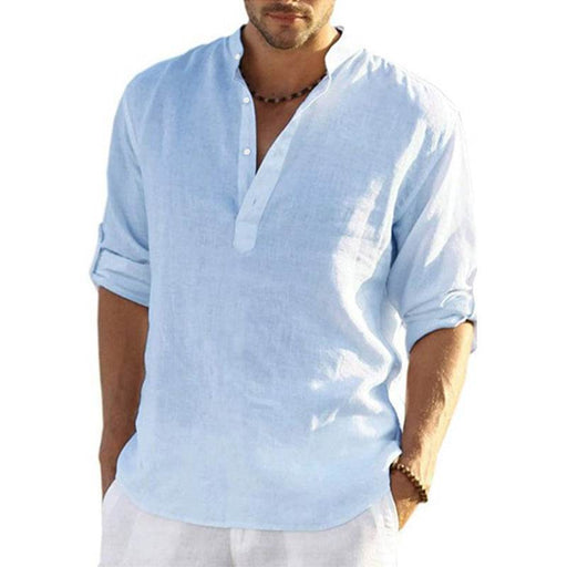 Man wearing a light blue linen shirt on a white background