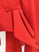 Close-up of a red coat with a button on a white background