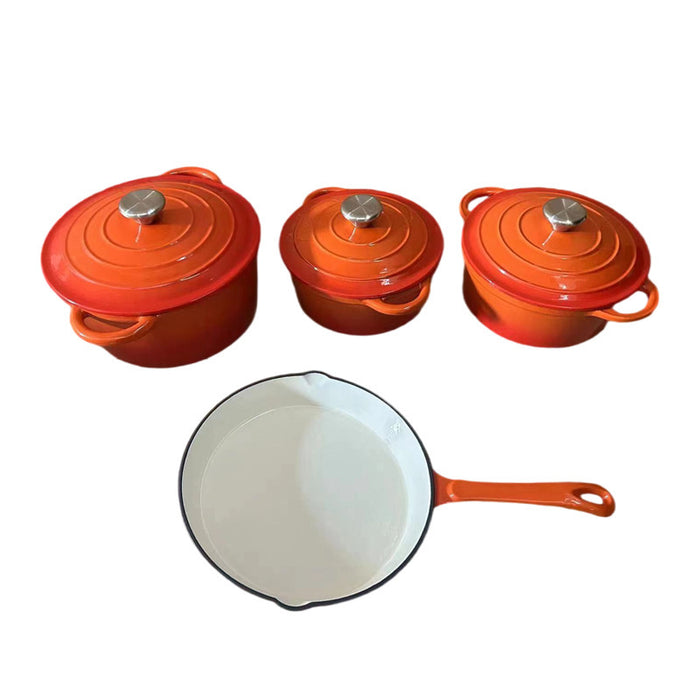 Set of three orange enameled cast iron cookware items on a white background