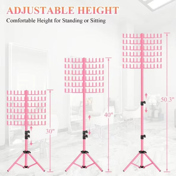 Pink adjustable height stand with measurements on a light gray background