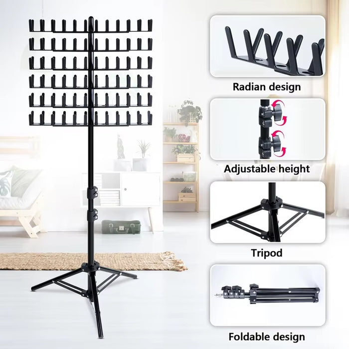 Black music stand with adjustable height, tripod design, and foldable feature on a white background.