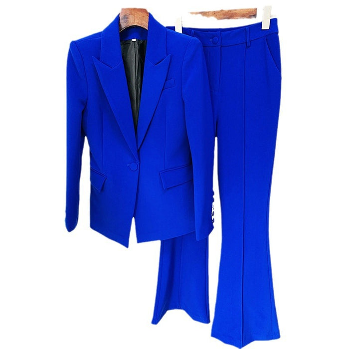 Blue suit with a blazer and pants on hangers against a white background