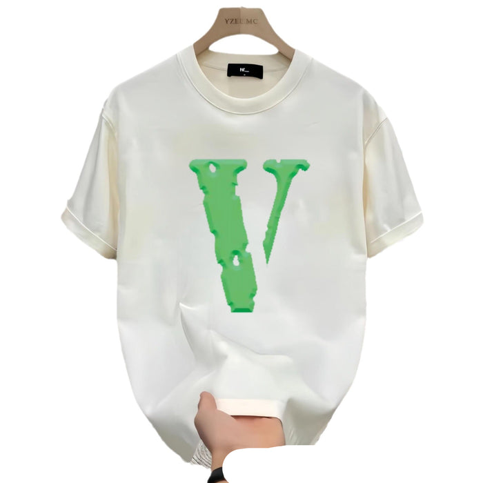 White t-shirt with green logo held by a hand on a white background