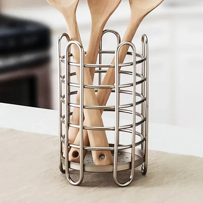 Metal leg stand with legs inside, on a neutral background