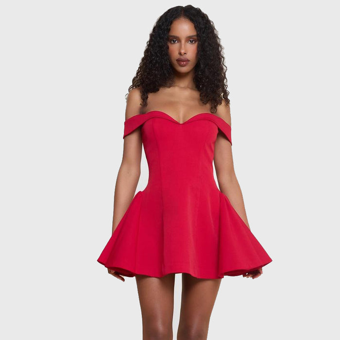 Woman wearing a red off-shoulder dress on a white background