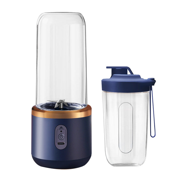 Navy blue portable blender with clear pitcher on a white background