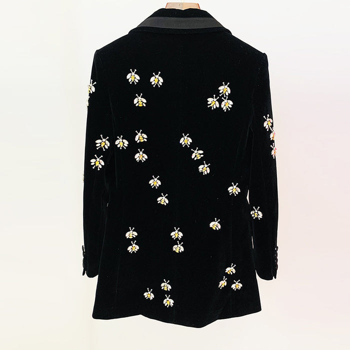 Black jacket with bee patterns on a white background