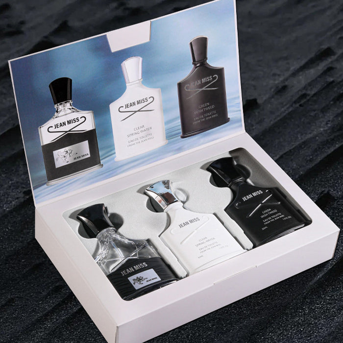 Set of Jean Miss perfume bottles in a display box on a dark background