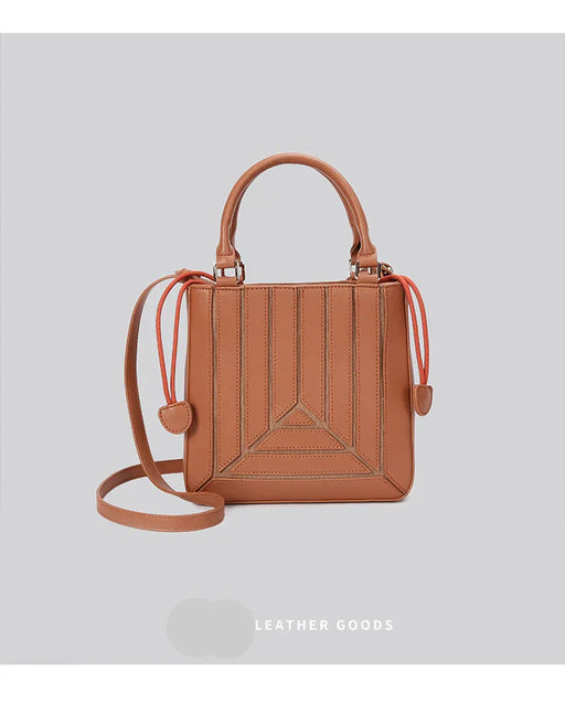 Brown leather handbag with a strap on a light gray background, featuring the brand 'LIHANMO LEATHER GOODS'.