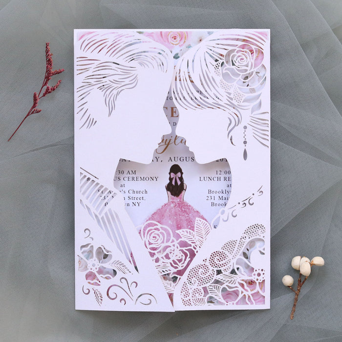 Decorative wedding invitation with floral and lace design on a gray background