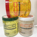 Three jars of Eco Styler professional styling gel on a white background