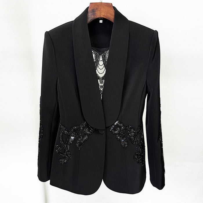 Black blazer with decorative elements on a white background