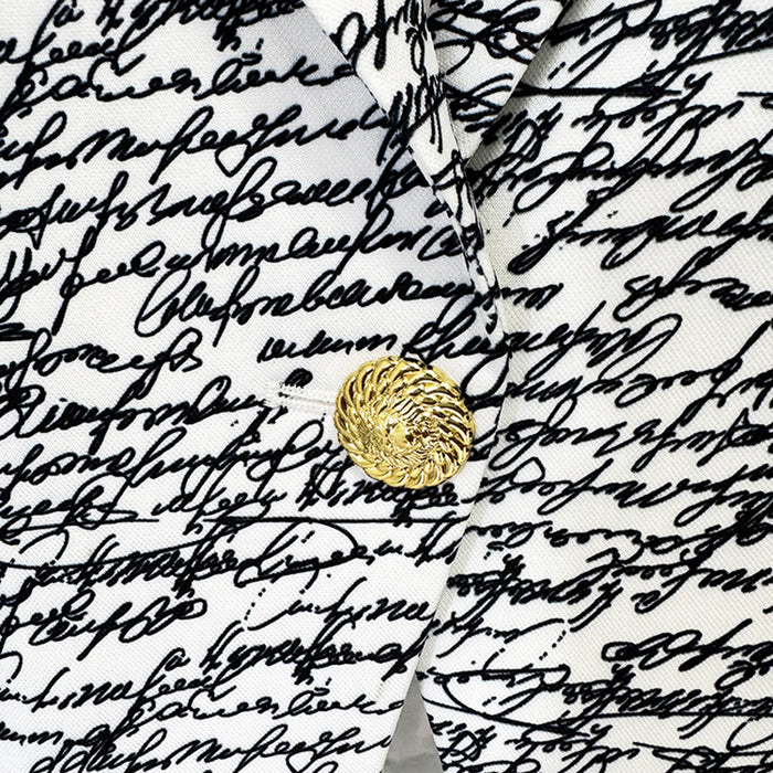 White fabric with black cursive text and a gold button