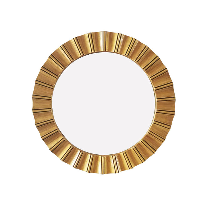 Round gold mirror with a white center on a white background