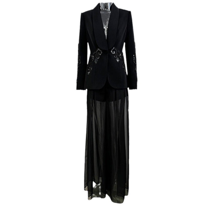 Black formal suit with sequin details on a white background