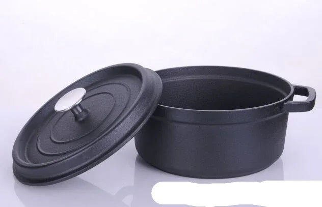 Black pot with lid on a white background