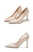 Pair of pink high-heeled shoes on a white background