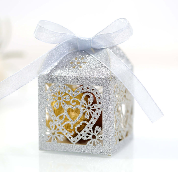 Decorative gift box with a white ribbon on a white background