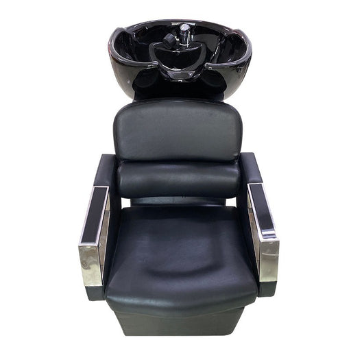 Black hair washing chair with basin on a white background