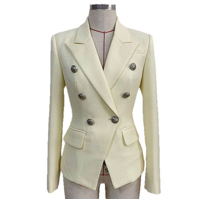 Cream-colored blazer on a mannequin against a white background