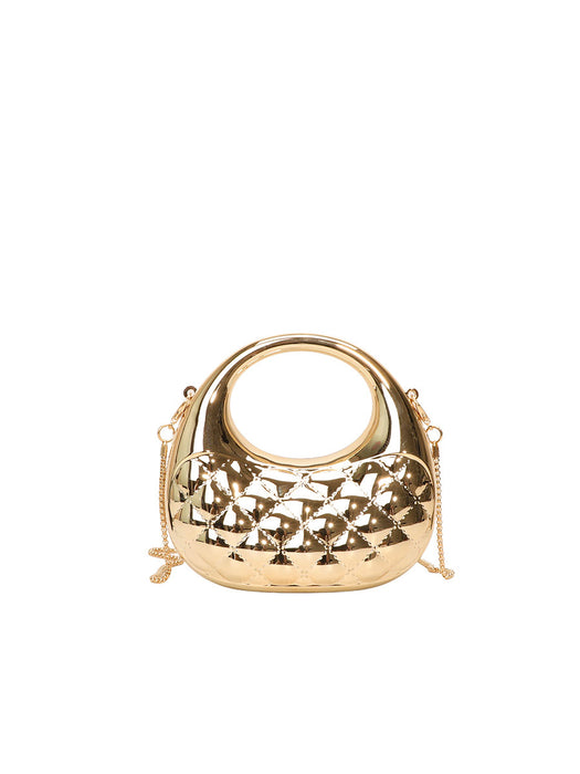 Gold handbag with intricate design on a white background