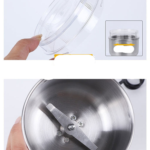 Stainless steel food processor with transparent lid and visible interior components.