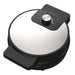 Black and white waffle maker on a white background