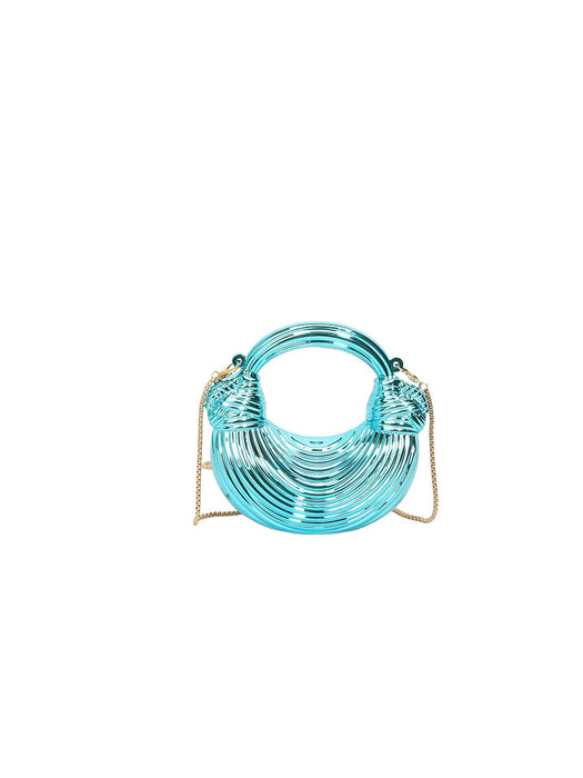 Turquoise handbag with a chain strap on a white background