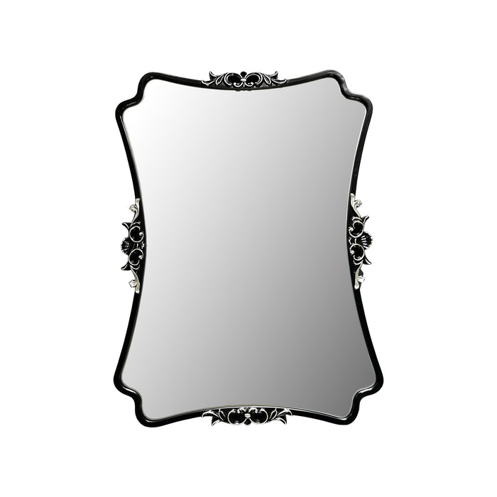 Decorative mirror with ornate black frame on a white background