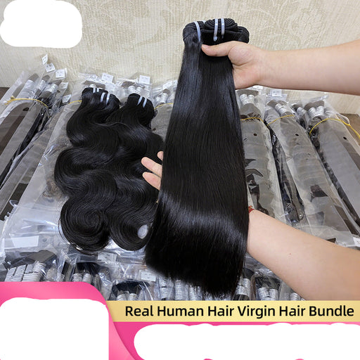 Hair extensions with a hand holding a bundle, displayed against a neutral background.