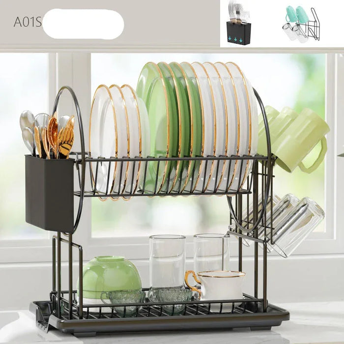 Two-tiered dish rack with various dishes and utensils on a light background