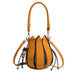 Brown handbag with decorative straps and a keychain on a white background