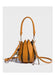 Yellow handbag with a unique design on a white background