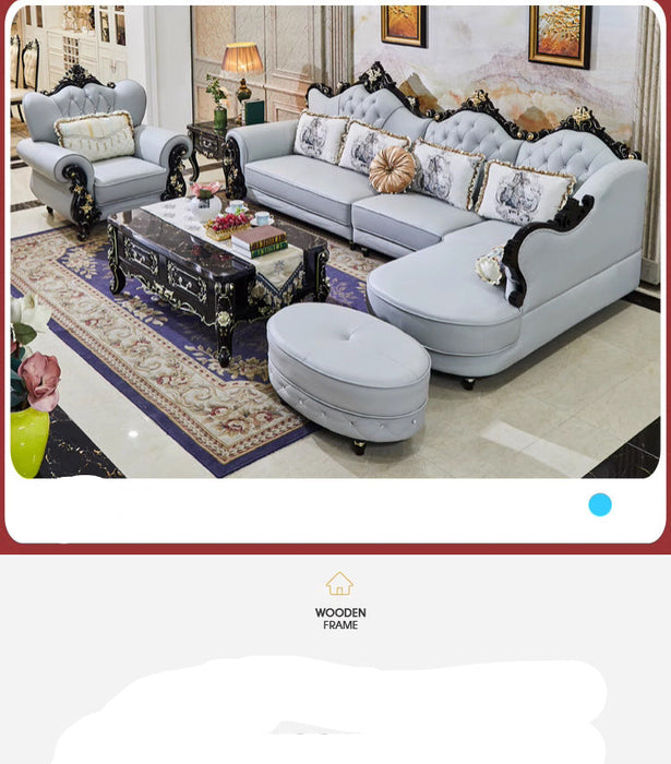 Luxury living room setup with gray sofa, coffee table, and decorative items.