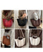 A 6-panel collage showing a women's structured bucket tote bag in multiple colors, worn by models in different outfits. The bag features a curved, tiered silhouette with vertical contrast stitching and top handles.
